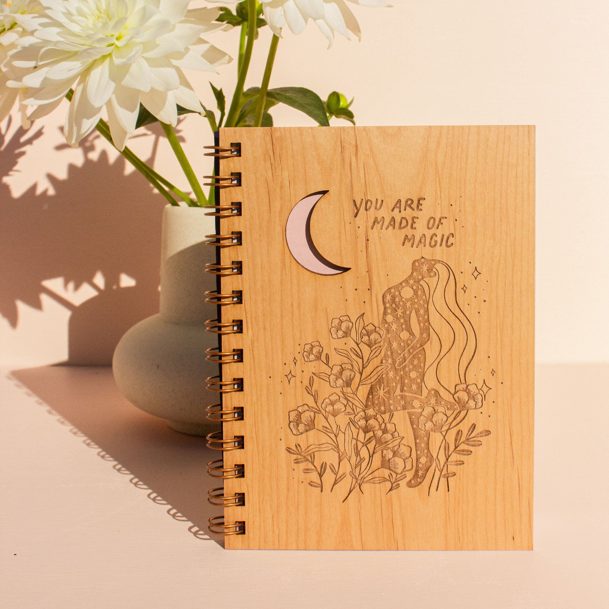 https://hereafter.la/cdn/shop/products/J.083-Hereafter-You-Are-Made-Of-Magic-Wood-Journal-1_2000x.jpg?v=1634927193